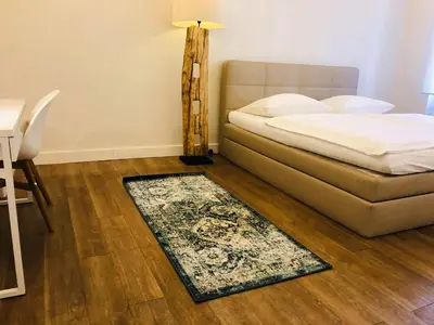 Ein Bett oder Betten in einem Zimmer der Unterkunft Jaspers Boutique Rooms