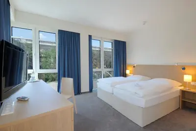 Ein Bett oder Betten in einem Zimmer der Unterkunft Hotel Berlin Mitte by Campanile