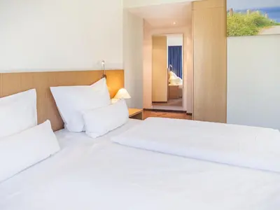 Ein Bett oder Betten in einem Zimmer der Unterkunft Hotel Berlin Mitte by Campanile
