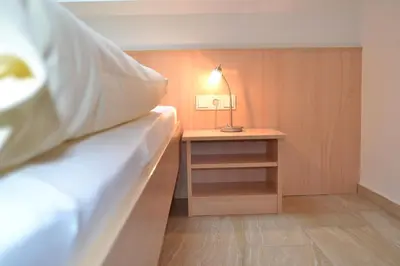 Ein Bett oder Betten in einem Zimmer der Unterkunft Beim Kahnfährmann