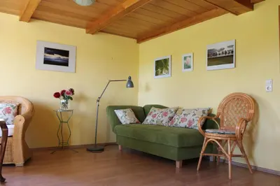 Ein Sitzbereich in der Unterkunft Ferienhaus Loose 8
