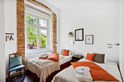 Ein Bett oder Betten in einem Zimmer der Unterkunft Arbio I Rustic Loft in Reuterkiez