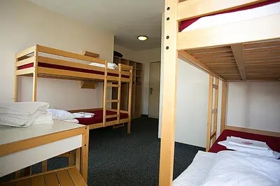 Ein Bett oder Betten in einem Zimmer der Unterkunft CVJM Jugendgästehaus Berlin