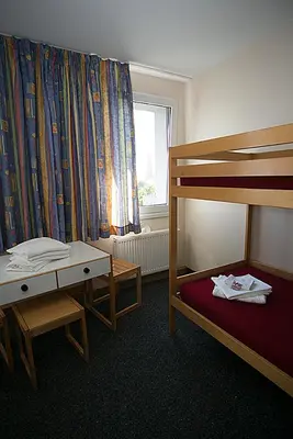 Ein Bett oder Betten in einem Zimmer der Unterkunft CVJM Jugendgästehaus Berlin