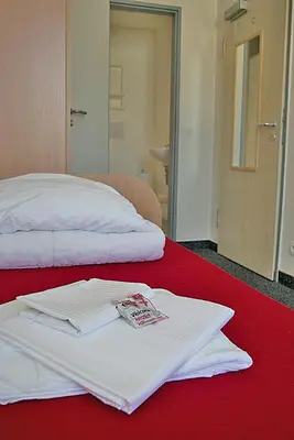 Ein Bett oder Betten in einem Zimmer der Unterkunft CVJM Jugendgästehaus Berlin
