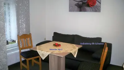 Ein Sitzbereich in der Unterkunft Ferienappartements Am Weinberg
