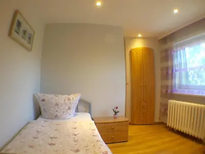 Ein Bett oder Betten in einem Zimmer der Unterkunft Pension im Grünen