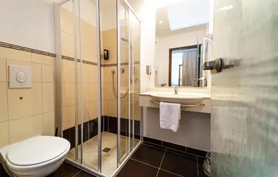 Ein Badezimmer in der Unterkunft Einklang - Dein Hotel am Südhorn