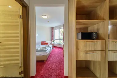 Ein Bett oder Betten in einem Zimmer der Unterkunft Einklang - Dein Hotel am Südhorn