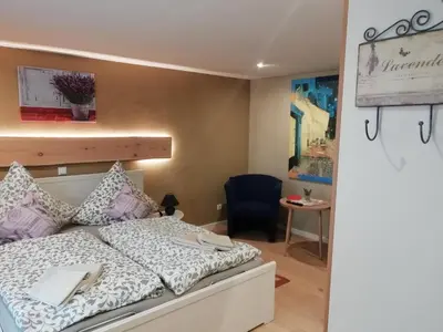 Ein Bett oder Betten in einem Zimmer der Unterkunft Neues Vaterland