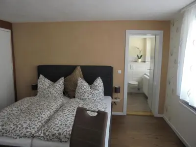 Ein Bett oder Betten in einem Zimmer der Unterkunft Neues Vaterland