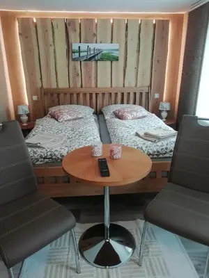 Ein Bett oder Betten in einem Zimmer der Unterkunft Neues Vaterland