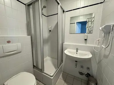 Ein Badezimmer in der Unterkunft Parkhotel Viktoria