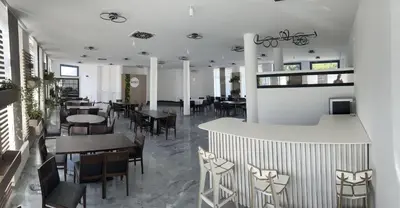 Ein Restaurant oder anderes Speiselokal in der Unterkunft Parkhotel Viktoria