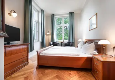Ein Bett oder Betten in einem Zimmer der Unterkunft Hotel Prinz Heinrich