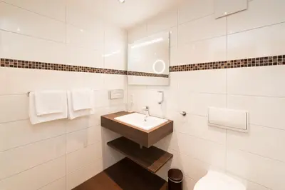 Ein Badezimmer in der Unterkunft Hotel Spree-idyll