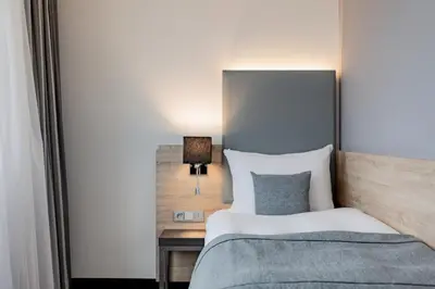 Ein Bett oder Betten in einem Zimmer der Unterkunft Garner Hotel Berlin - Spandau by IHG