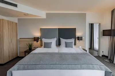 Ein Bett oder Betten in einem Zimmer der Unterkunft Garner Hotel Berlin - Spandau by IHG