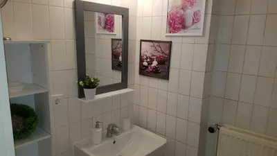 Ein Badezimmer in der Unterkunft City Apartment, good location