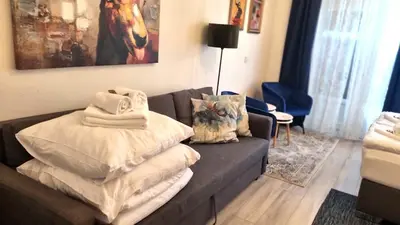 Ein Bett oder Betten in einem Zimmer der Unterkunft City Apartment, good location