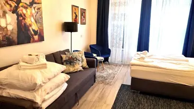 Ein Bett oder Betten in einem Zimmer der Unterkunft City Apartment, good location