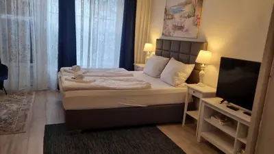 Ein Bett oder Betten in einem Zimmer der Unterkunft City Apartment, good location