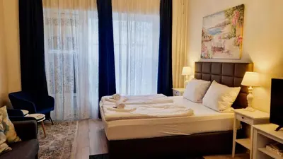 Ein Bett oder Betten in einem Zimmer der Unterkunft City Apartment, good location