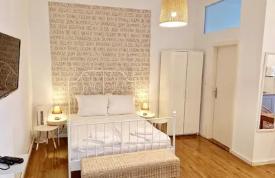 Ein Bett oder Betten in einem Zimmer der Unterkunft Stylish & Cosy Apartment in Berlin, WiFi