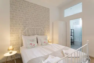 Ein Bett oder Betten in einem Zimmer der Unterkunft Stylish & Cosy Apartment in Berlin, WiFi