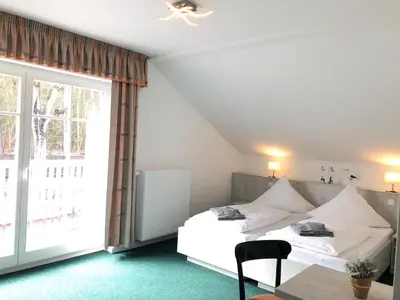 Ein Bett oder Betten in einem Zimmer der Unterkunft Neu-Helgoland