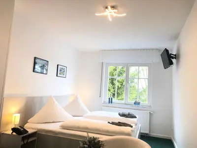 Ein Bett oder Betten in einem Zimmer der Unterkunft Neu-Helgoland