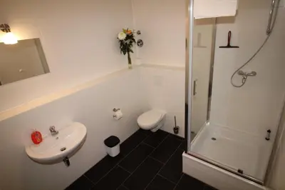 Ein Badezimmer in der Unterkunft Apartments Tempelhof