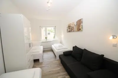 Ein Bett oder Betten in einem Zimmer der Unterkunft Apartments Tempelhof