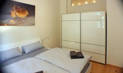 Ein Bett oder Betten in einem Zimmer der Unterkunft Wohnen am Roseneck