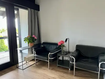 Ein Sitzbereich in der Unterkunft Hotel My Schildow
