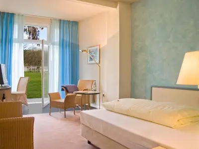 Ein Bett oder Betten in einem Zimmer der Unterkunft Zum Rittmeister