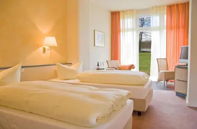Ein Bett oder Betten in einem Zimmer der Unterkunft Zum Rittmeister