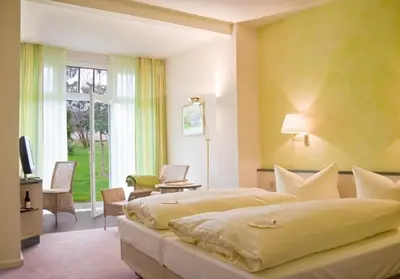 Ein Bett oder Betten in einem Zimmer der Unterkunft Zum Rittmeister