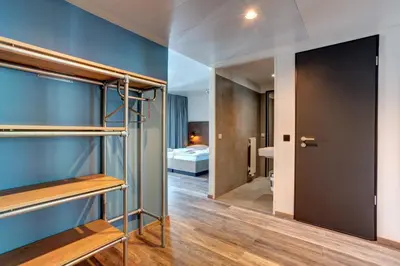 Ein Bett oder Betten in einem Zimmer der Unterkunft MEININGER Hotel Berlin Tiergarten