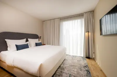 Ein Bett oder Betten in einem Zimmer der Unterkunft June Six Hotel Berlin City West