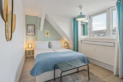 Ein Bett oder Betten in einem Zimmer der Unterkunft Holiday 33 Apartments ABCD Alexanderplatz