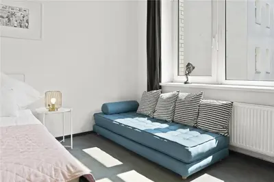 Ein Bett oder Betten in einem Zimmer der Unterkunft Holiday 33 Apartments ABCD Alexanderplatz