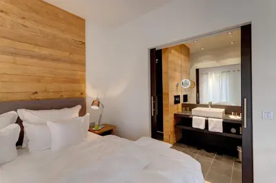 Ein Bett oder Betten in einem Zimmer der Unterkunft Hotel Strandhaus - Boutique Resort & Spa