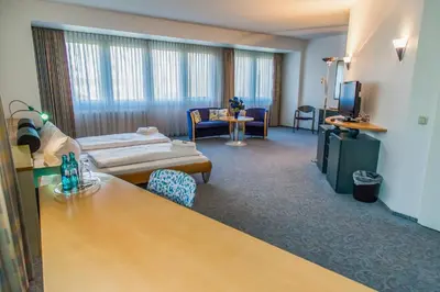 Ein Bett oder Betten in einem Zimmer der Unterkunft Seepark Hotel am Wandlitzsee