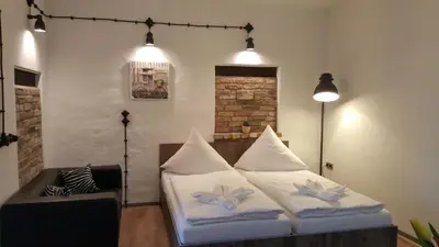 Ein Bett oder Betten in einem Zimmer der Unterkunft Gästehaus Strausberg
