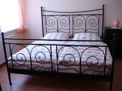 Ein Bett oder Betten in einem Zimmer der Unterkunft Ferienwohnung Schob