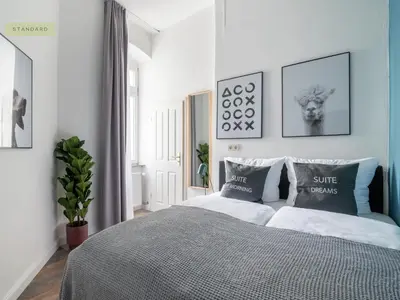 Ein Bett oder Betten in einem Zimmer der Unterkunft Apartments Berlin Bornimer Straße