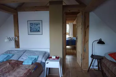 Ein Bett oder Betten in einem Zimmer der Unterkunft Fachwerkhaus am Fluss