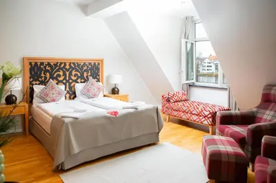 Ein Bett oder Betten in einem Zimmer der Unterkunft Hotel Altes Fährhaus