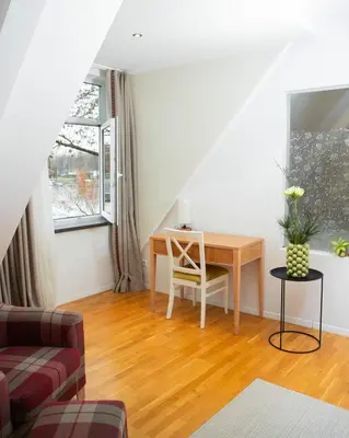 Ein Sitzbereich in der Unterkunft Hotel Altes Fährhaus